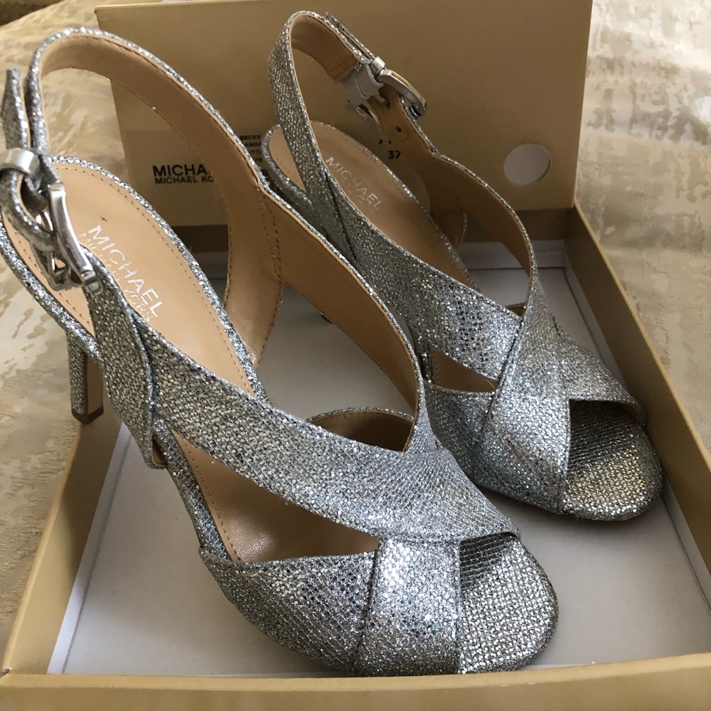 Michael Kors silver glitter dress sandals.